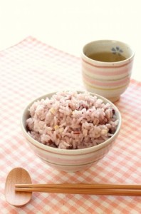 brown rice and green tea with chopsticks