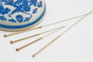 acupuncture needles presented on a table