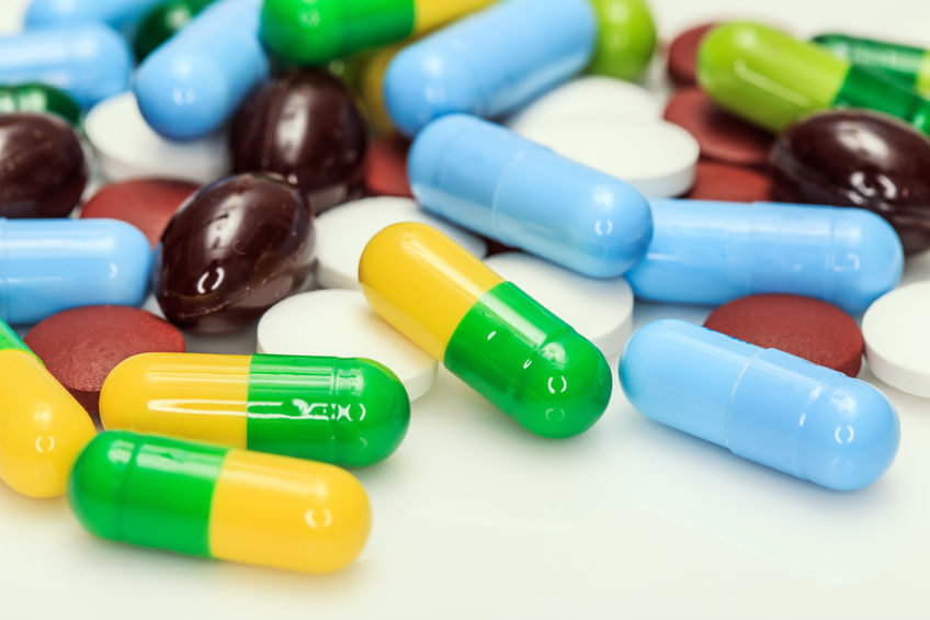 colorful medication pill on a table